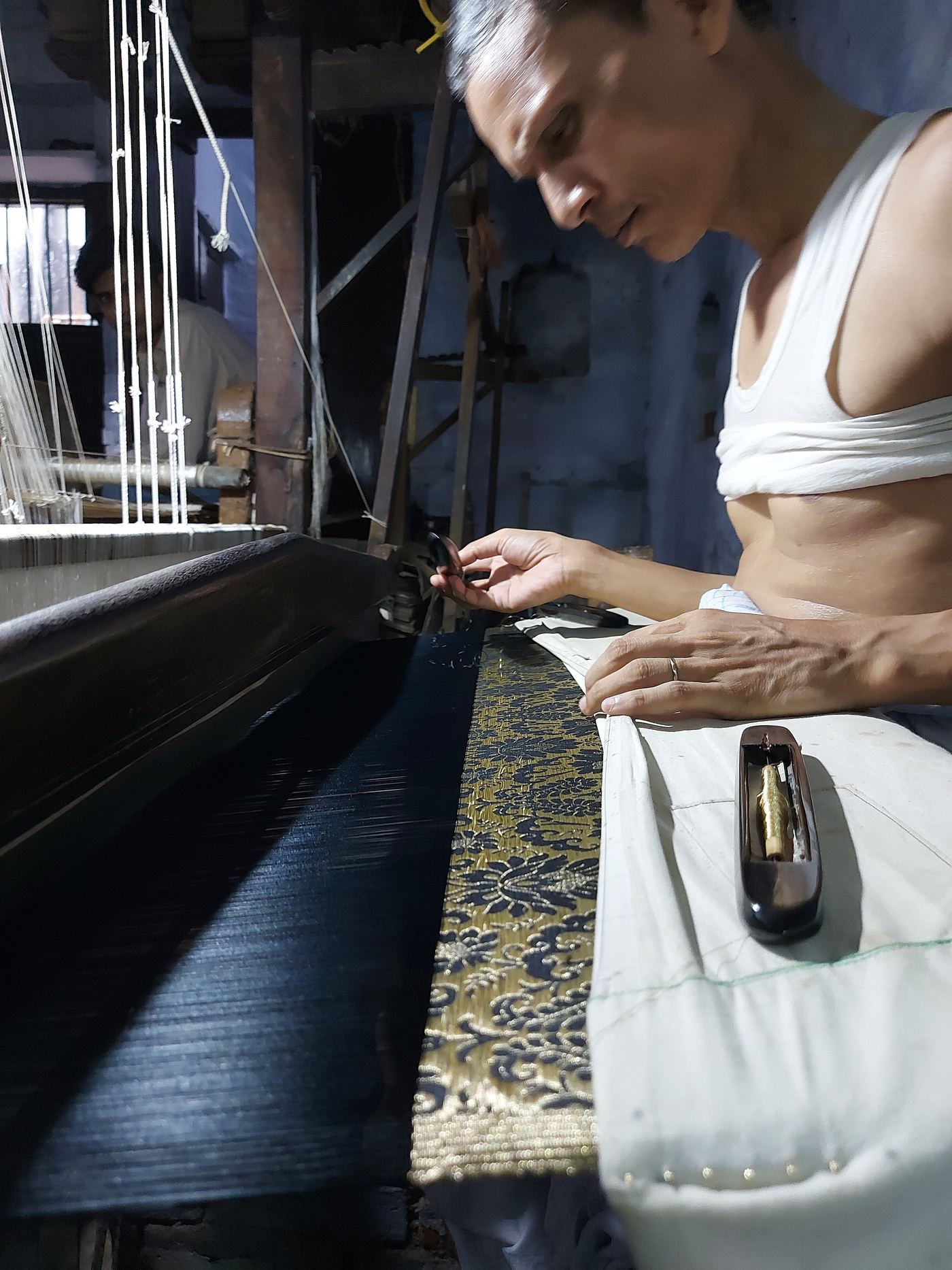 A weaver at a handloom